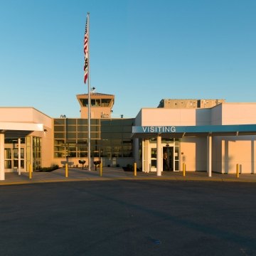 Housing and Healthcare Facility Stockton Entrance with U.S. Flag