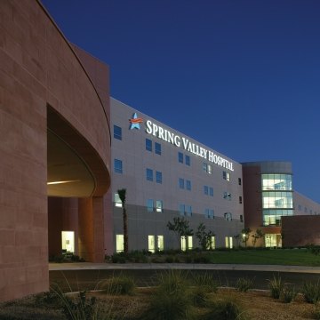 Exterior view of spring valley hospital at nighttime