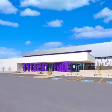 Millennium High School Gym exterior entrance and parking lot