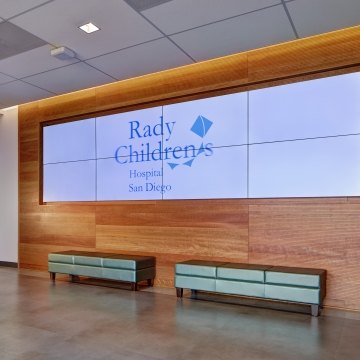 Large video screen on lobby wall in Rady Children’s Hospital Administrative Office Building and Conference Center 