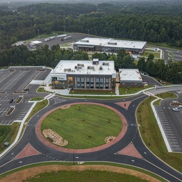Exterior aerial view of the Carroll Campus building and landscaping.
