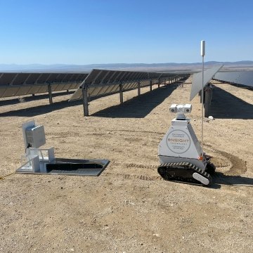The OnSight Technology robot in front of solar panels