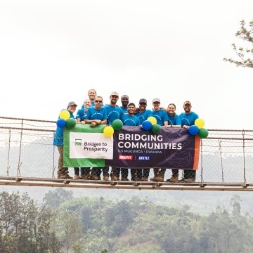 Group of people standing on a bridge