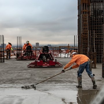 A McCarthy crew on a project with a cityscape view