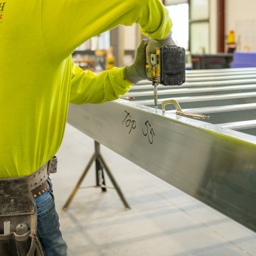 A person working with a power tool